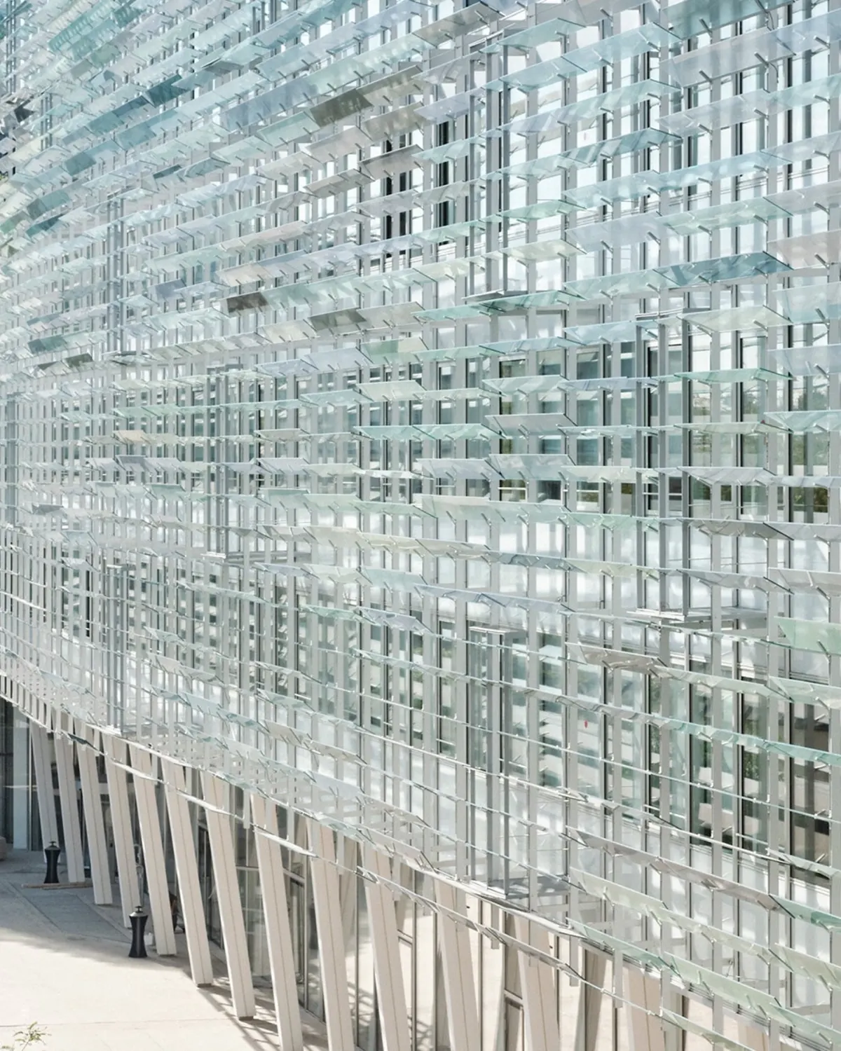 Layered glass fins forming a geometric modern building façade